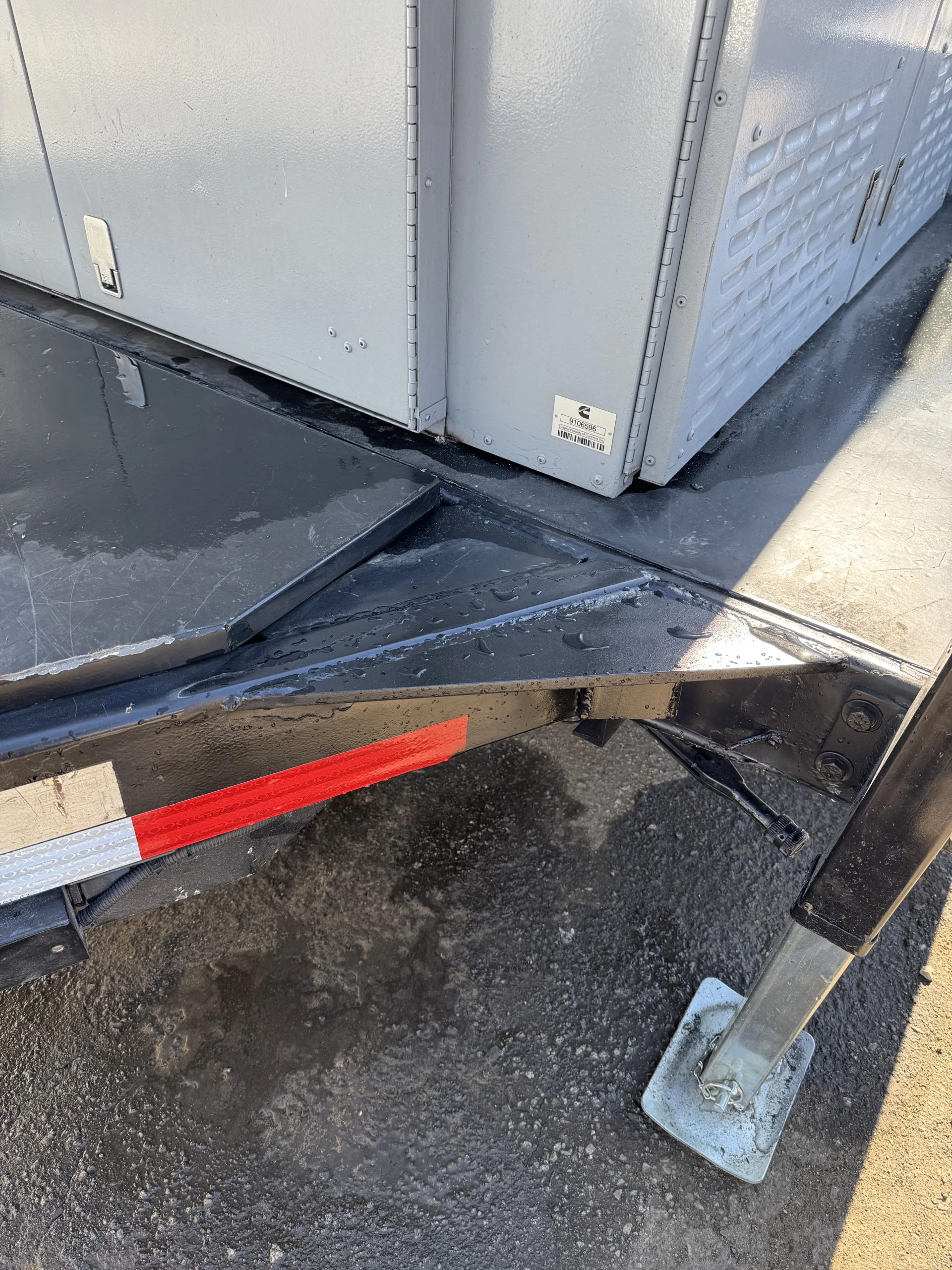 Cracked generator trailer frame reinforced with new welded steel plate